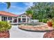 Private backyard oasis with pool, patio, outdoor dining and mature landscaping at 2512 S Dundee St, Tampa, FL 33629
