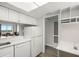Kitchen has new appliances and a pass-through to the living room with great water views at 2616 Cove Cay Dr # 803, Clearwater, FL 33760
