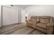 Comfortable living space with a love seat, closet, and access to additional rooms, features modern flooring at 2616 Cove Cay Dr # 803, Clearwater, FL 33760