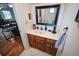 Bathroom featuring a wood vanity, marble countertop, and tile flooring at 2780 E Sam Allen Rd, Plant City, FL 33565