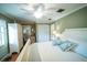 Comfortable bedroom boasts a ceiling fan, light-colored walls, and lots of natural light at 2780 E Sam Allen Rd, Plant City, FL 33565
