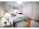 Inviting bedroom with matching bedside tables, natural light, and closet at 2780 E Sam Allen Rd, Plant City, FL 33565