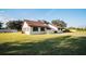 Spacious home exterior with well-maintained lawn and landscaping at 2780 E Sam Allen Rd, Plant City, FL 33565
