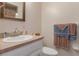 Neutral bathroom featuring a white vanity with a light brown countertop and neutral wall color at 31076 Castle Ridge Drive, Brooksville, FL 34602