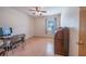 Bright bedroom with hardwood floors, natural light, and ample space for setting up a home office at 31076 Castle Ridge Drive, Brooksville, FL 34602