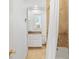 Bright bathroom with a tub and shower with a tiled surround at 321 Brightwaters Ne Blvd, St Petersburg, FL 33704