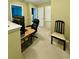 Bright office space with desk, chair, and neutral carpeting at 32111 Brookstone Dr, Wesley Chapel, FL 33545