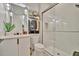 Modern bathroom features a sleek vanity, pendant lighting, and glass enclosed shower at 32324 Rosewood Meadow Ln, Wesley Chapel, FL 33543