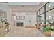 Welcoming foyer with marble floors, modern decor, statement mirror wall, and ample natural light at 32324 Rosewood Meadow Ln, Wesley Chapel, FL 33543