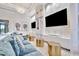 Relaxing lounge with a large comfortable couch and decor at 32324 Rosewood Meadow Ln, Wesley Chapel, FL 33543