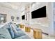 Relaxing lounge with a large comfortable couch and decor at 32324 Rosewood Meadow Ln, Wesley Chapel, FL 33543