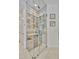 View of the glass-enclosed wine cellar and cooler at 32324 Rosewood Meadow Ln, Wesley Chapel, FL 33543
