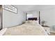 Bedroom featuring wood floors, a four-poster bed, ceiling fan, and decorative accents at 3238 6Th W Ave, Palmetto, FL 34221