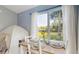 Bright dining nook with natural light and views of the back yard, including a play tent at 3238 6Th W Ave, Palmetto, FL 34221