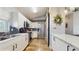 Modern kitchen with stainless steel appliances, subway tile backsplash, and white cabinetry at 3238 6Th W Ave, Palmetto, FL 34221
