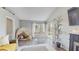 Open-concept living room with a dining nook and views to the backyard at 3238 6Th W Ave, Palmetto, FL 34221