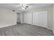 Spacious bedroom with new floors, a ceiling fan, and ample closet space at 3706 Greenery Ct # 206, Tampa, FL 33618