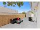 Backyard featuring outdoor seating, privacy screen, storage shed and modern air conditioner at 4003 W Lemon St, Tampa, FL 33609