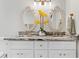 Beautiful bathroom featuring dual sinks and decorative mirrors at 4003 W Lemon St, Tampa, FL 33609