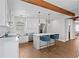 Bright, newly remodeled kitchen featuring stainless appliances, subway tile backsplash and a charming center island with seating at 4003 W Lemon St, Tampa, FL 33609