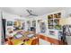 Open-concept dining area with stylish decor, ceiling fan, and views into other living spaces at 4563 25Th S Ave, St Petersburg, FL 33711