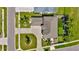 Aerial view of the roof of the house and driveway surrounded by landscaping at 4612 Netherwood Dr, Tampa, FL 33624