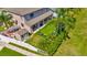 Spacious backyard featuring a putting green, fenced-in yard, and covered patio at 4612 Netherwood Dr, Tampa, FL 33624