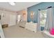 Well-lit bedroom with two dressers, decorations, and sheer curtains at 4612 Netherwood Dr, Tampa, FL 33624
