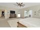 Spacious main bedroom features a ceiling fan and a walk-in closet at 4612 Netherwood Dr, Tampa, FL 33624