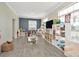 Spacious playroom with laminate flooring, large windows, and ample storage for toys and games at 4612 Netherwood Dr, Tampa, FL 33624