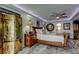 Spacious bedroom featuring a queen-size bed, elegant lighting, and stylish decor at 5200 Brittany S Dr # 204, St Petersburg, FL 33715
