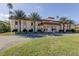 Charming community center with lush landscaping and welcoming facade, perfect for residents gatherings and activities at 5200 Brittany S Dr # 204, St Petersburg, FL 33715