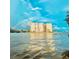 Waterfront building view featuring a stunning rainbow overhead, promising picturesque scenery at 5200 Brittany S Dr # 204, St Petersburg, FL 33715