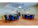 This game room is equipped with card tables and comfortable seating, creating an inviting space at 5200 Brittany S Dr # 204, St Petersburg, FL 33715