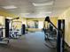 Community gym and fitness center with ample machines and free weights at 5200 Brittany S Dr # 204, St Petersburg, FL 33715
