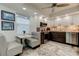 Modern kitchen with stainless steel appliances, white and gray cabinets, and eat-in nook at 5200 Brittany S Dr # 204, St Petersburg, FL 33715