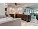 Modern kitchen with stainless steel appliances, a breakfast nook, and sleek countertops, illuminated by recessed lighting at 5200 Brittany S Dr # 204, St Petersburg, FL 33715