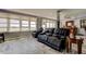 Comfortable living room featuring plush seating and expansive windows with beautiful water views at 5200 Brittany S Dr # 204, St Petersburg, FL 33715