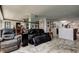 Spacious living area with a stylish design, comfortable seating, and easy access to other living spaces at 5200 Brittany S Dr # 204, St Petersburg, FL 33715