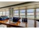 Functional office space featuring a large desk and stunning water views from expansive windows at 5200 Brittany S Dr # 204, St Petersburg, FL 33715
