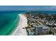 Beautiful beach with turquoise water, soft sand, and nearby resorts offers the perfect vacation getaway at 5340 Royal Palm Ave # 5340, Sarasota, FL 34234