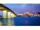 Scenic waterfront view showcasing the bridge and illuminated buildings during twilight hours at 5340 Royal Palm Ave # 5340, Sarasota, FL 34234