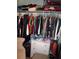 Well-organized closet with rods, shelves, and a dresser for optimal clothing storage at 5413 S Martin Ave, Tampa, FL 33611