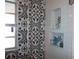 Modern shower featuring decorative niche, glass partition, and contemporary fixtures at 5413 S Martin Ave, Tampa, FL 33611