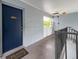Hallway leading to an apartment with a welcome mat at 5509 Fountain Lake Cir # C209, Bradenton, FL 34207