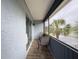 This patio features wood floors and seating at 5509 Fountain Lake Cir # C209, Bradenton, FL 34207