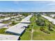 Overhead view of lovely community homes, with mature landscaping and serene walking paths at 6524 11Th W Ave # 5611, Bradenton, FL 34209