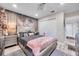 Cozy bedroom featuring a decorative chandelier, closet and neutral color scheme at 6524 11Th W Ave # 5611, Bradenton, FL 34209