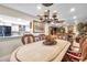 Dining room with decorative chandelier open to kitchen and living room at 6524 11Th W Ave # 5611, Bradenton, FL 34209