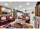 Open-concept living room with comfortable seating, ceiling fan and sliding doors at 6524 11Th W Ave # 5611, Bradenton, FL 34209